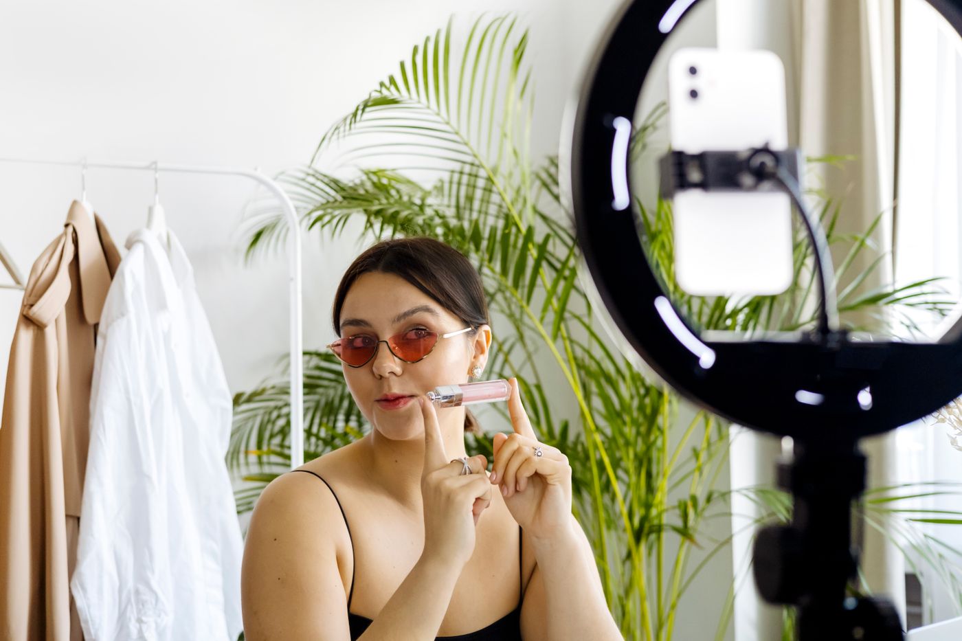 Beauty creator showcasing cosmetic product